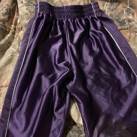 Other - Purple boys basketball shorts with white stripe